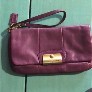 Purple Coach wristlet